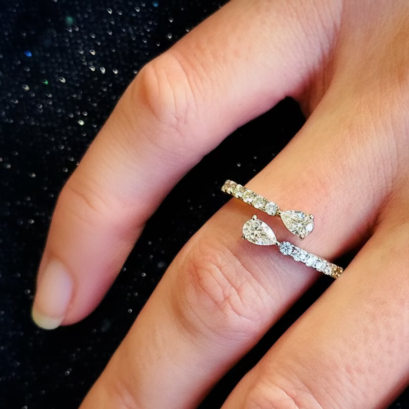 Perfect Pear ring set with two pear and brilliant cut diamonds, mounted in platinum