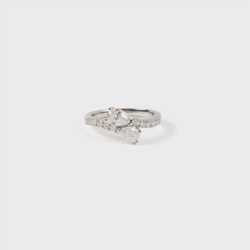 Perfect Pear ‘Toi Et Moi’ ring set with two pear and brilliant cut diamonds. Mounted in Platinum.